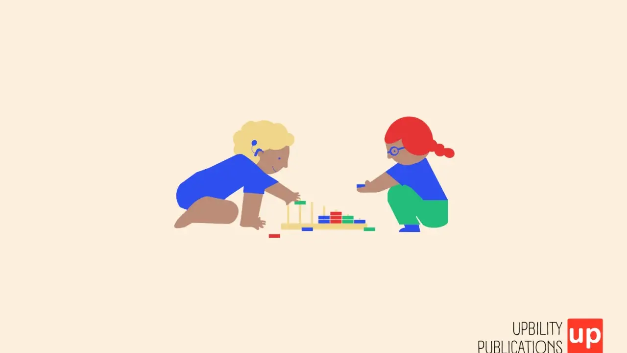 Bambini giocano con blocchi colorati, esplorando attività sensoriali per l'autismo.