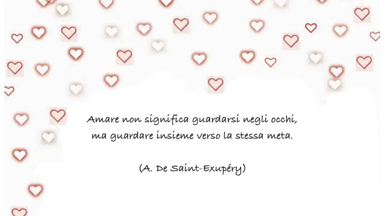 Cuori rossi e bianchi circondano una citazione sull'amore e l'amicizia, perfetta per frasi amicizia bambini.