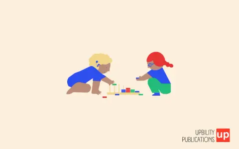 Bambini giocano con blocchi colorati, esplorando attività sensoriali per l'autismo.