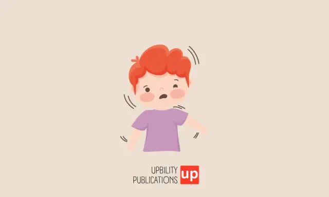 Bambino con capelli rossi e maglietta viola, con espressione confusa e mani leggermente tremanti, che illustra le emozioni autismo.