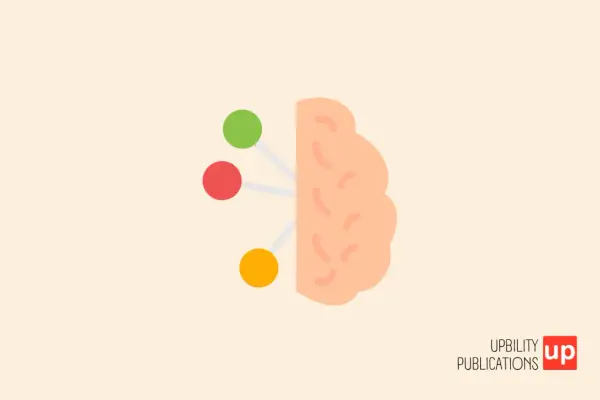 Cervello stilizzato con tre cerchi colorati collegati, simbolo di disprassia motoria e difficoltà di coordinazione.
