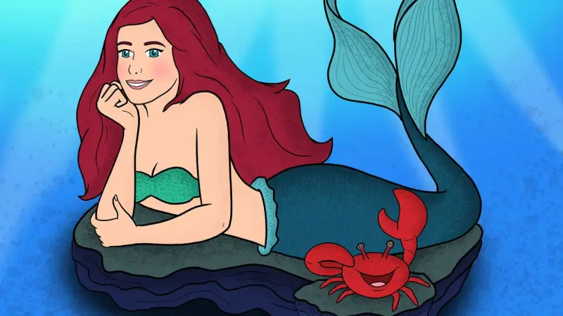 Ariel sirenetta, con la sua coda blu e i capelli rossi, riposa su una roccia, mentre un granchietto sorride accanto a lei.